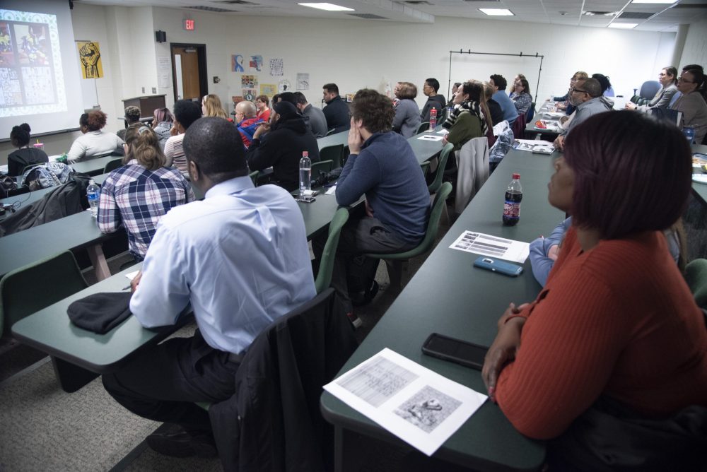 Full classroom with attentive people